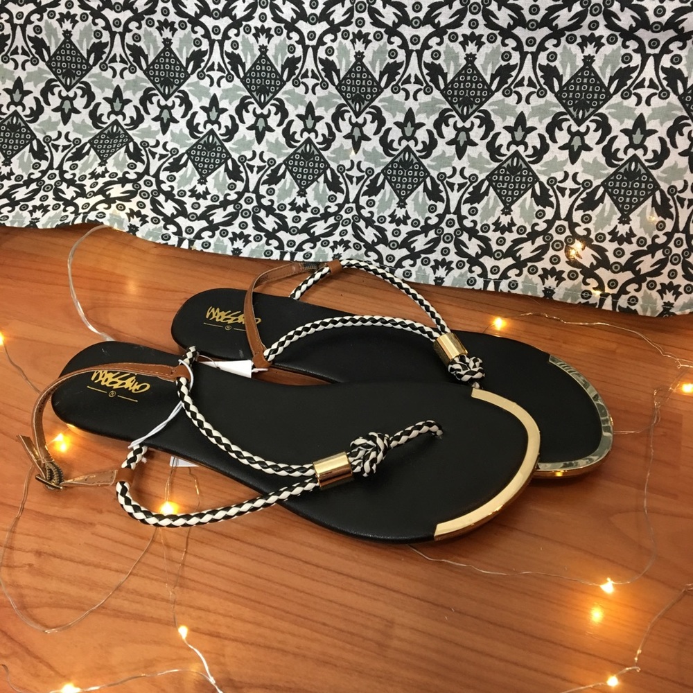 Brand new black and white Sandals